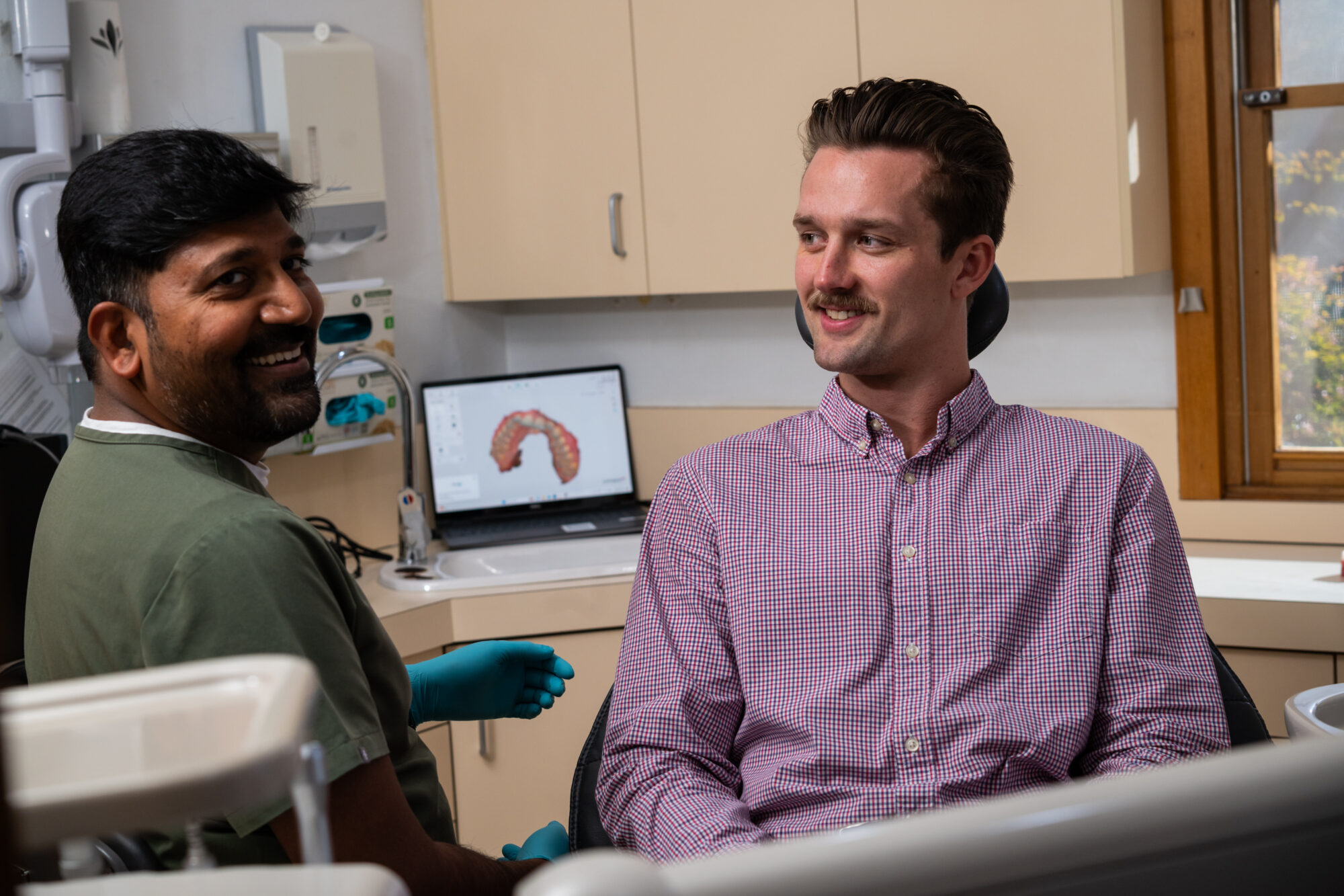 Discussing a written treatment plan and costs at Dental Embassy, Braddon
